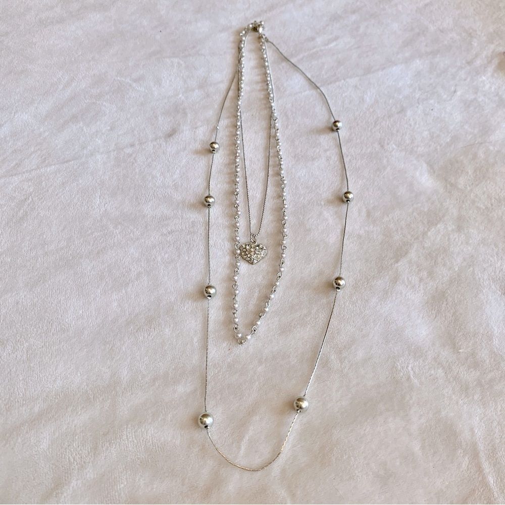 Silver tone multi layer necklace with heart and beads